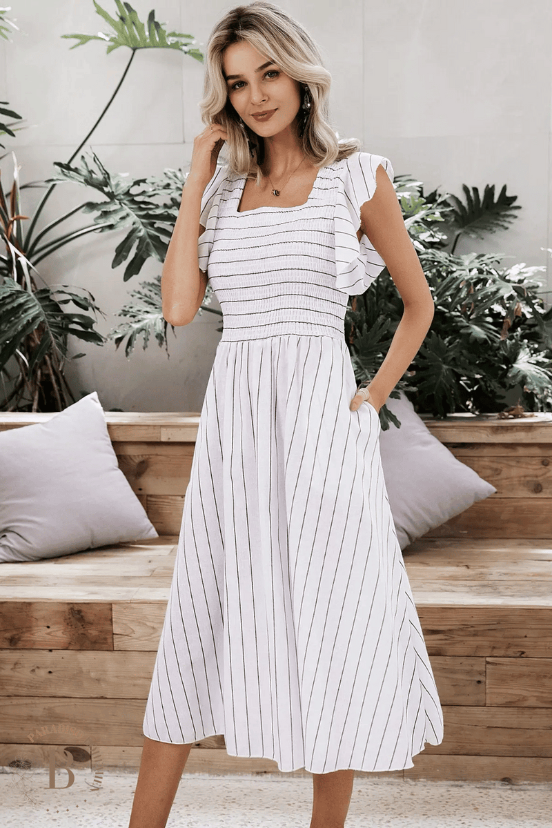 Vestito bianco e sales nero a righe